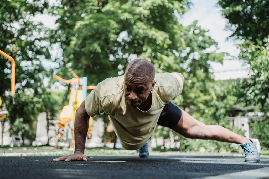 a man doing push ups outside