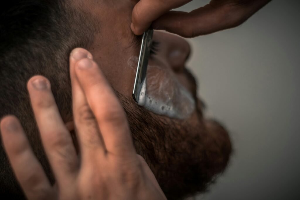 a man shaving his beard